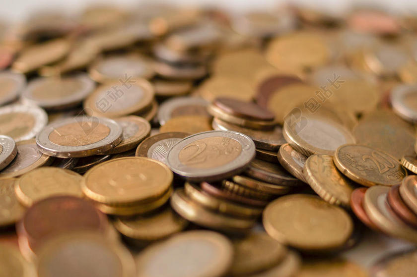 金色金融微观堆积的硬币背景图片