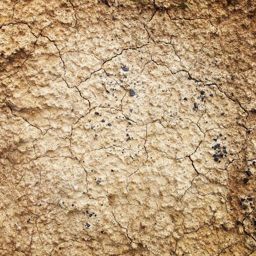 棕黄干涸裂纹土壤背景图片