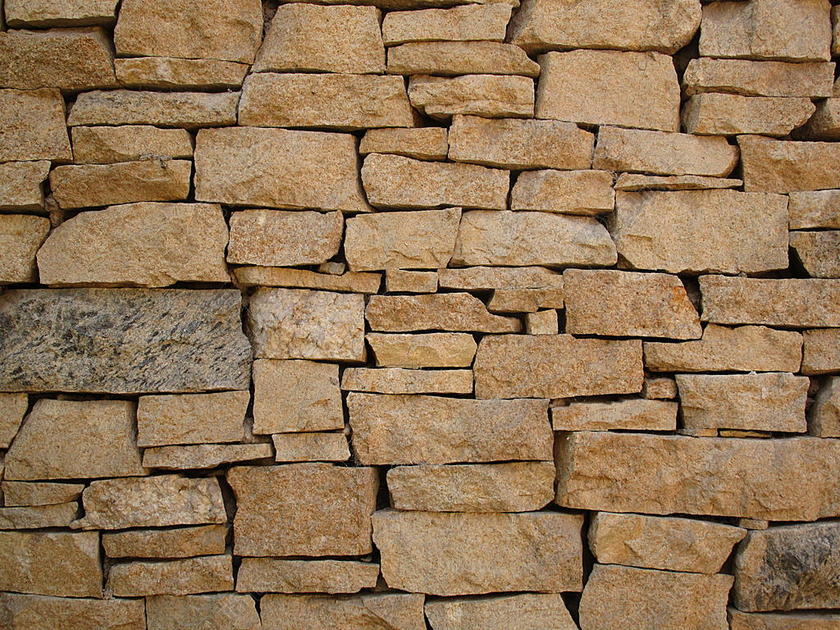 棕色纹理无规则不同形状石块拼接纹理设计背景图片