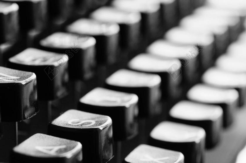 科技发展古老古董原始打字机键盘字幕机械式背景图片