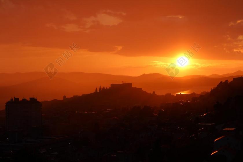 金色旅游摄影远景全景日出日落城市背景图片