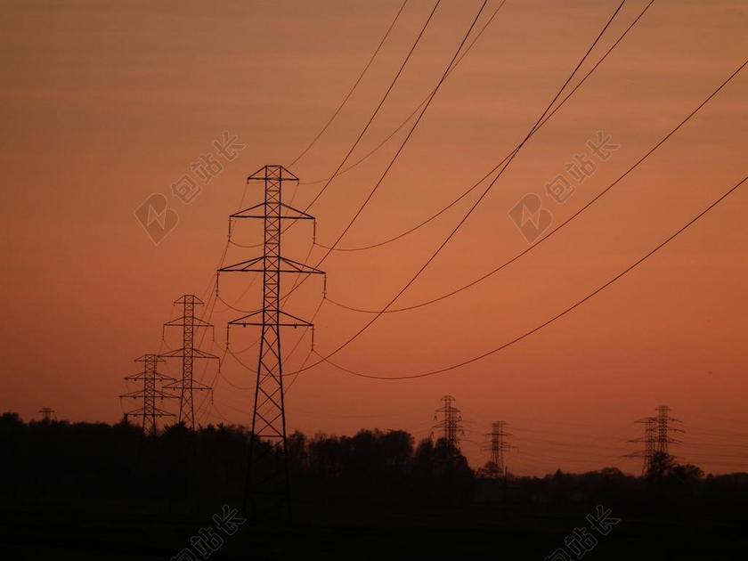 黄黑能源经典黄昏下的电线塔电力运输户外背景图片