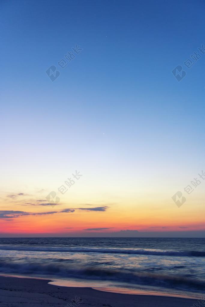 蓝色海天一线夕阳背景图片