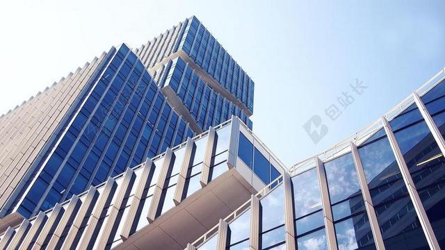 仰视现代城市公司大楼大厦建筑多层不规则高层建筑