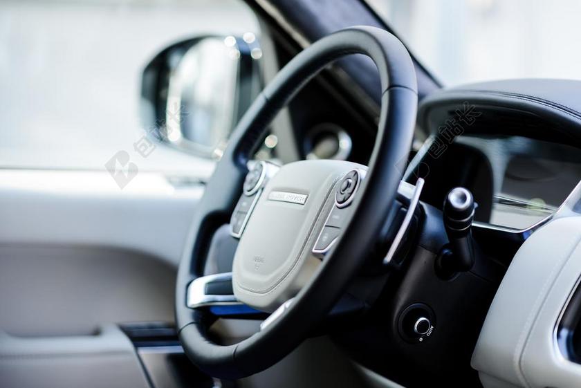 黑色汽车局部黑色方向盘背景图片