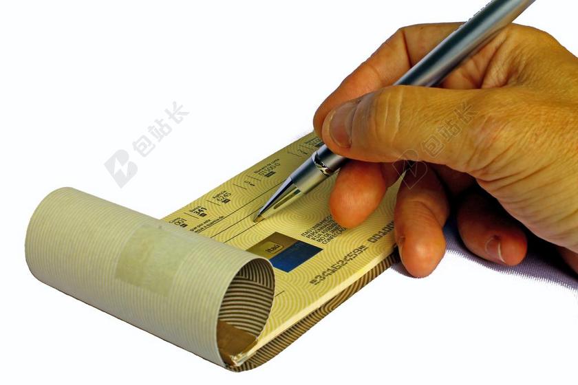 人写支票的手背景图片
