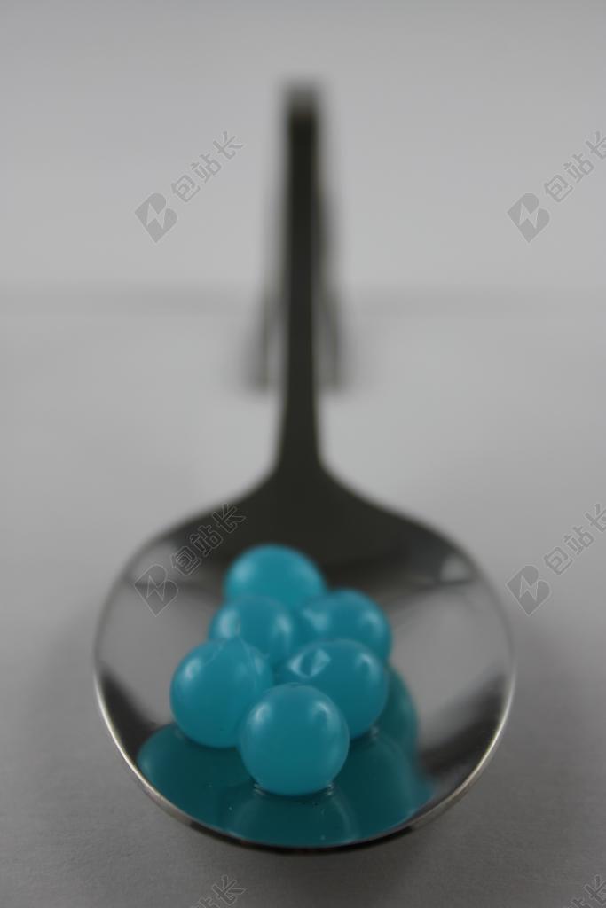 珍珠在一个小瓶里背景图片