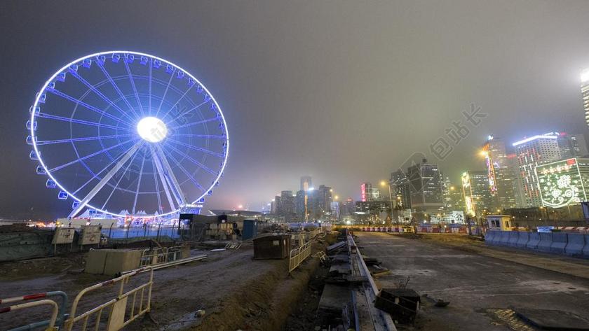 建筑夜景夜晚美丽的摩天轮灯光背景图片