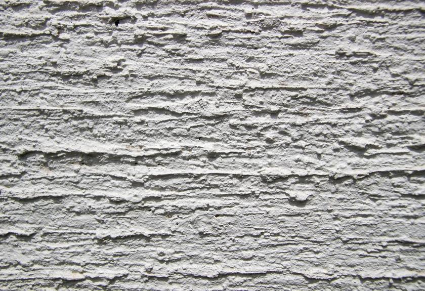 建筑白色的粗糙墙面背景图片