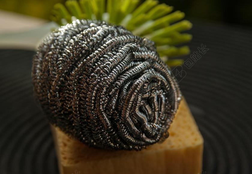 摄影金属风清洁钢丝球特写宣传背景图片