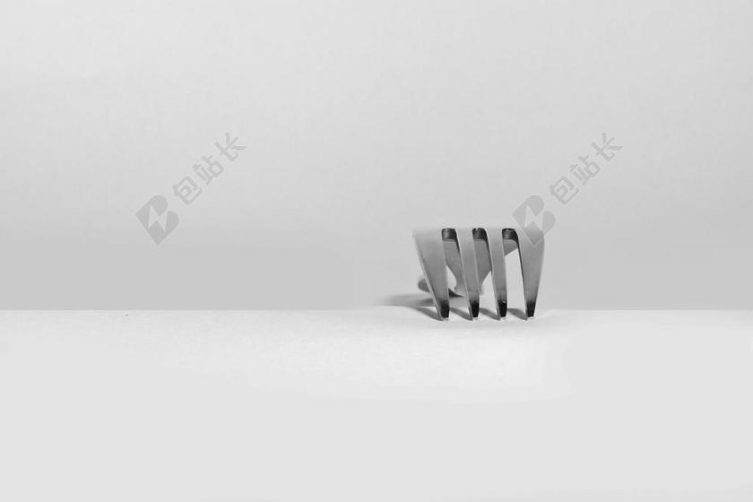 白色金属叉子餐具背景图片