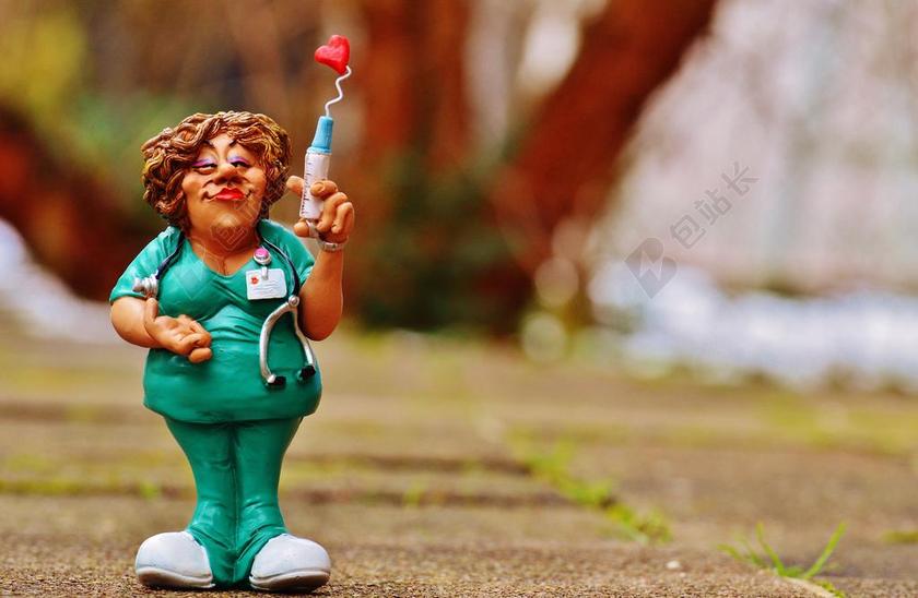 打针的护士玩偶背景图片