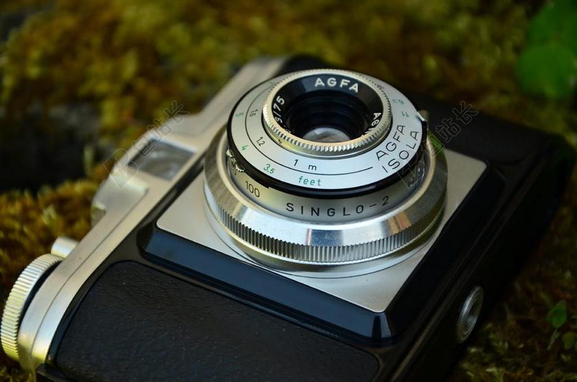 银色照相机聚焦背景图片