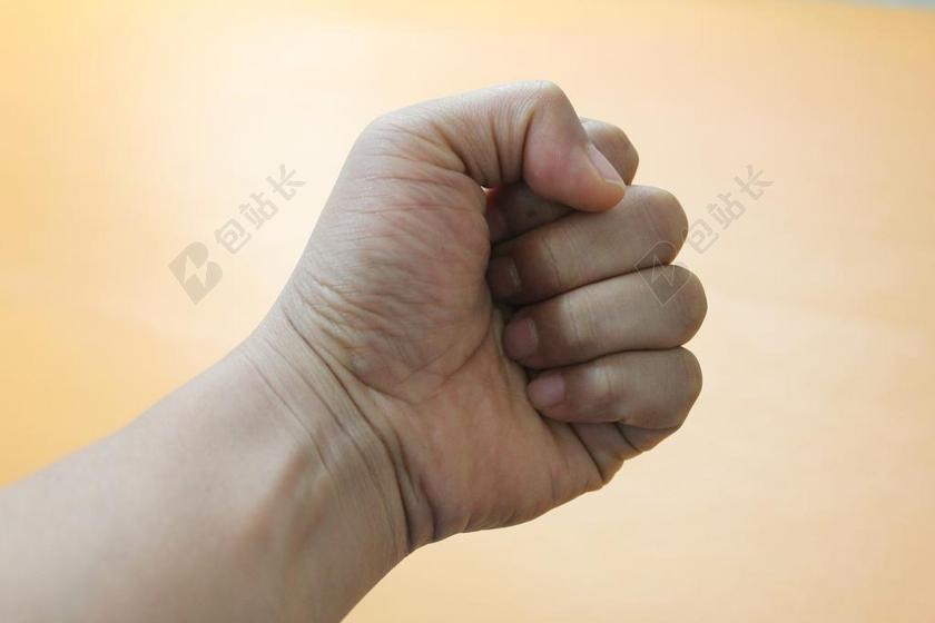 广告清新手握拳头的男子背景图片