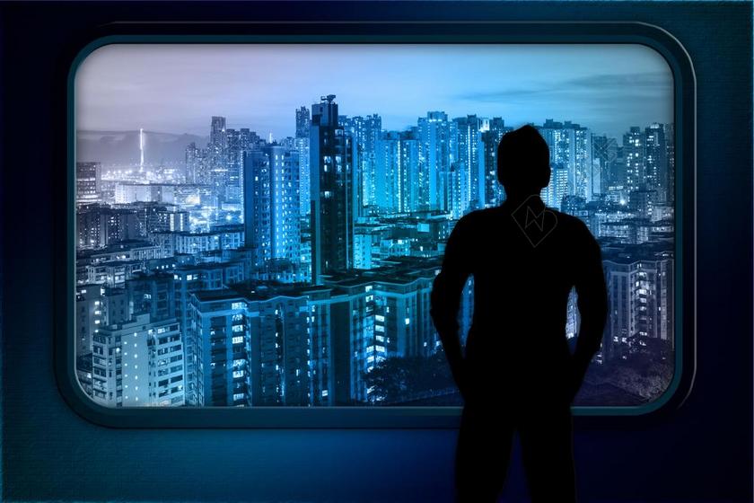 窗边的男人背影背景图片