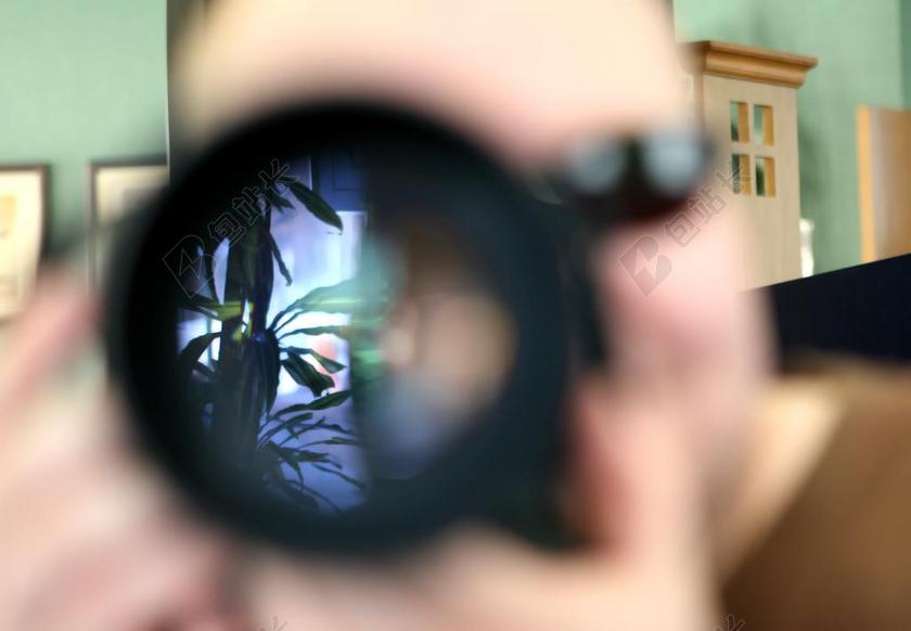 拍摄植物的摄影师背景图片