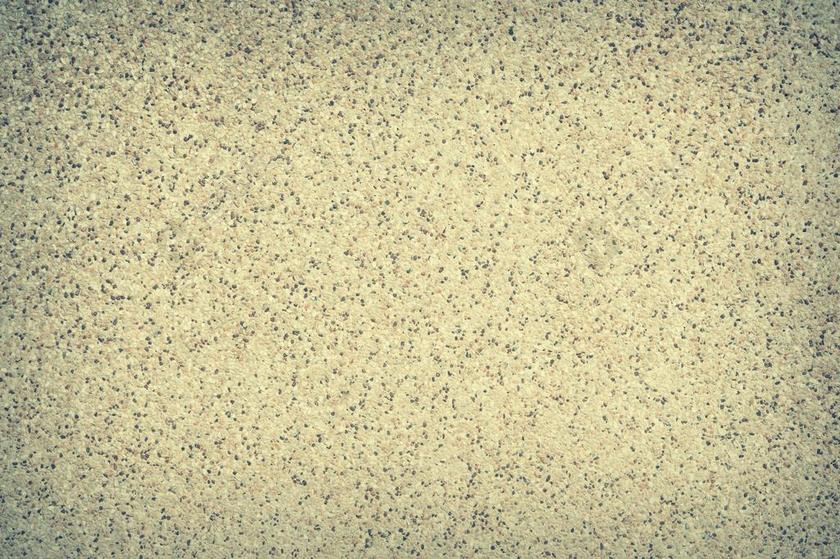 黄色纹理混杂黄色背景上的黑点纹理设计背景图片