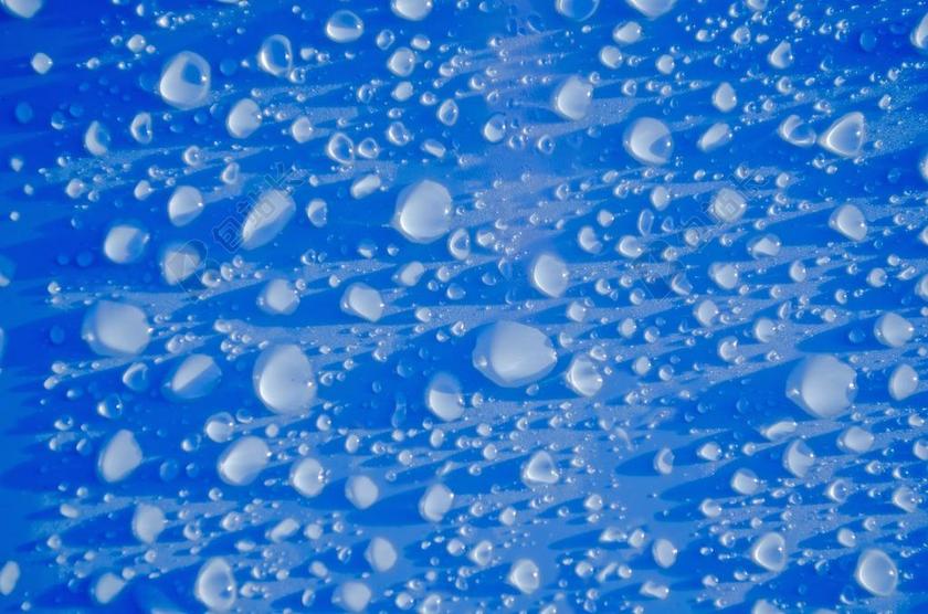 蓝色表面的水珠背景图片