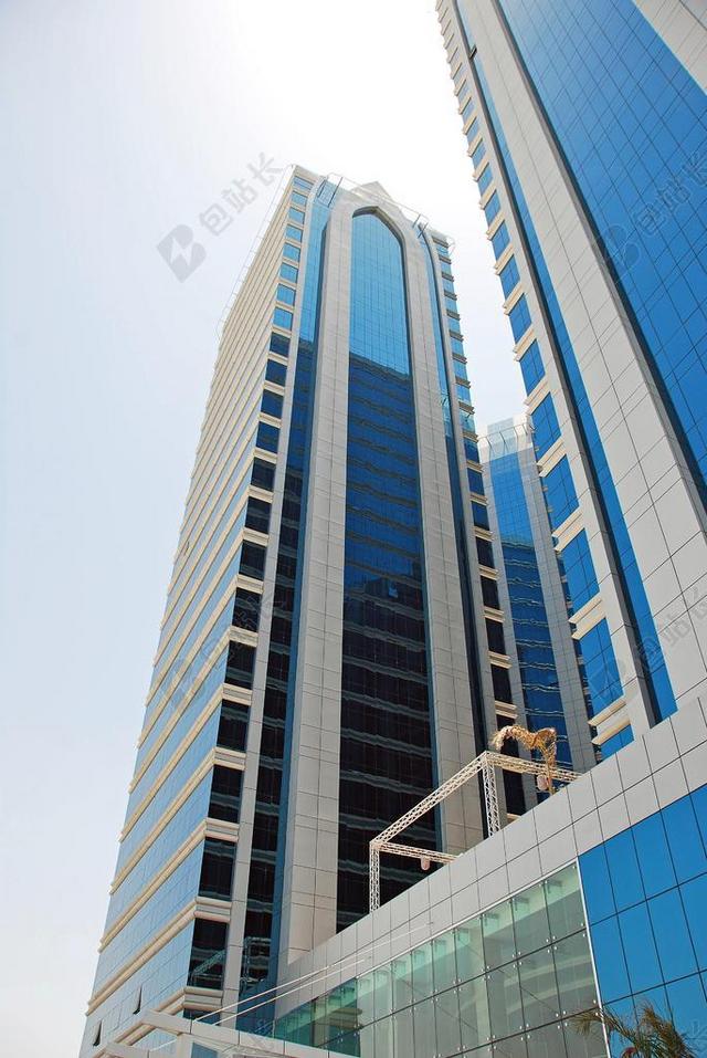 蓝色建筑现代摩天大楼玻璃幕墙仰视拍摄图片背景