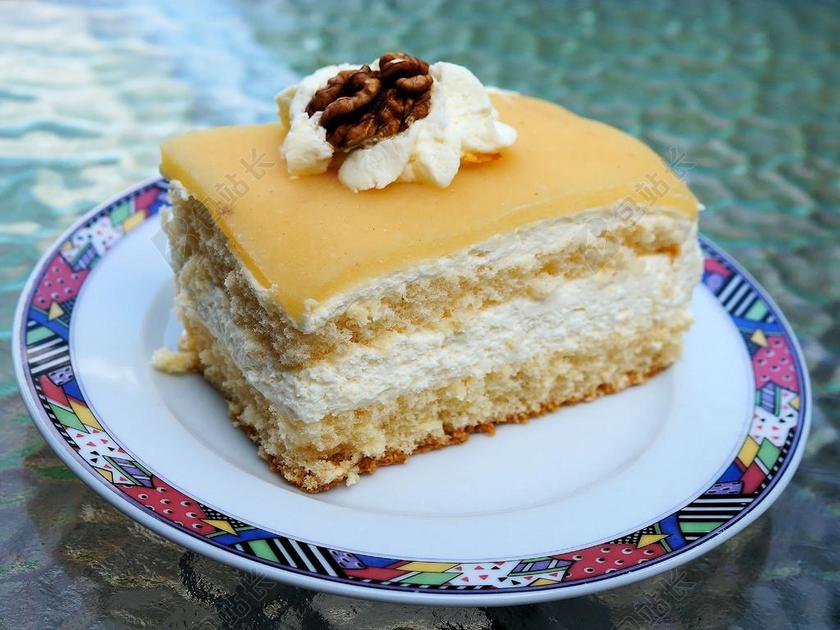 甜品店蛋糕店美味甜果仁蛋糕背景图片