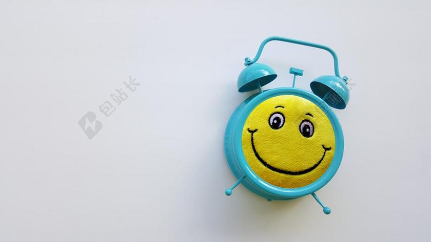 蓝色闹钟笑脸没有时间背景图片