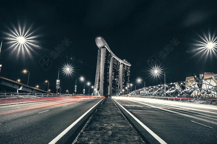 建筑炫彩灯光下的造型建筑物建筑设计城市景观背景图片