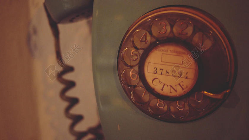 摄影文艺电话机上的数字特写电话机通讯摄影背景图片