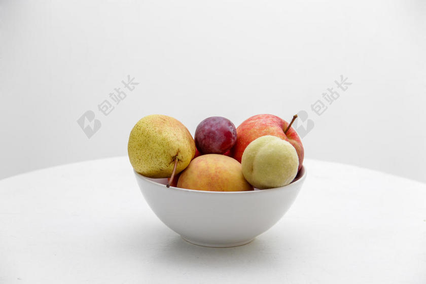 彩色食物水果碗的梨苹果等食物水果背景图片