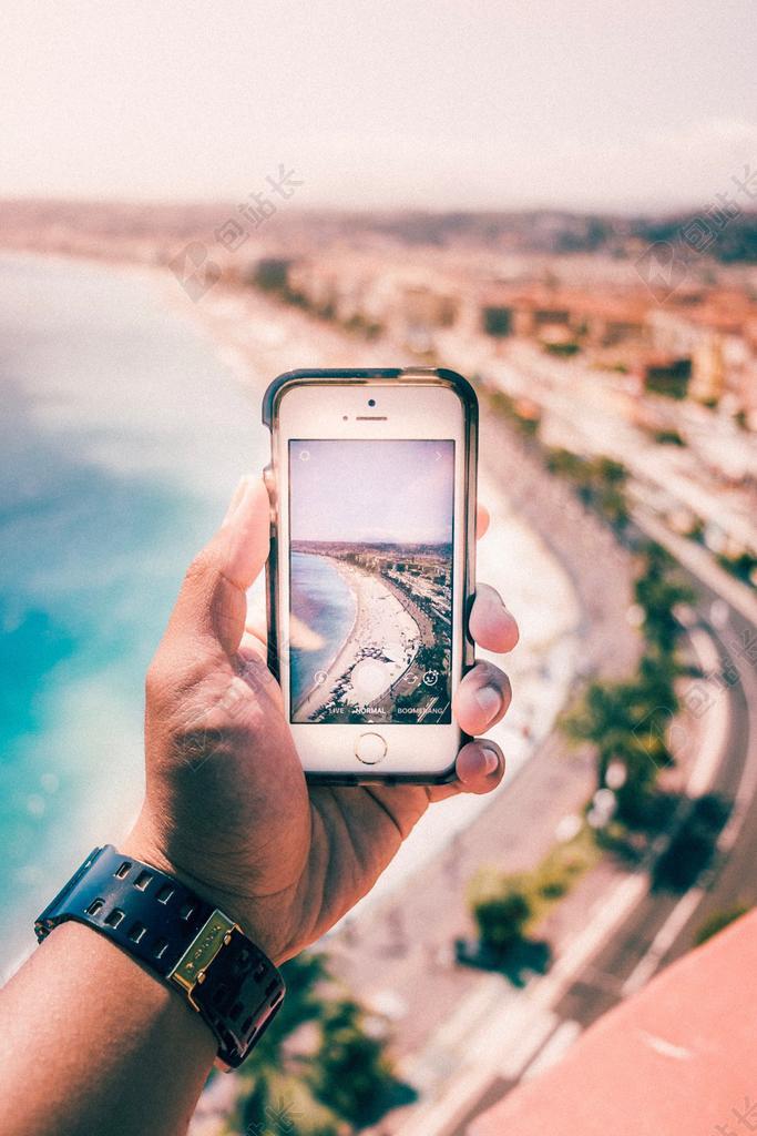 美丽的海湾和手机照片背景图片