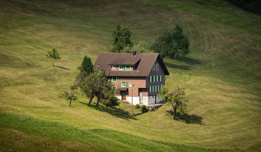山坡上的小房子背景图片
