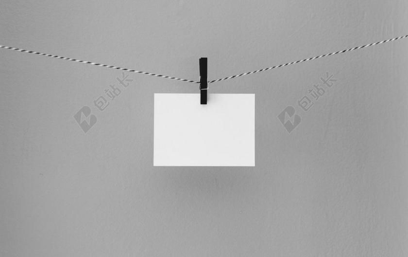 黑色的夹子和白色的照片背景图片