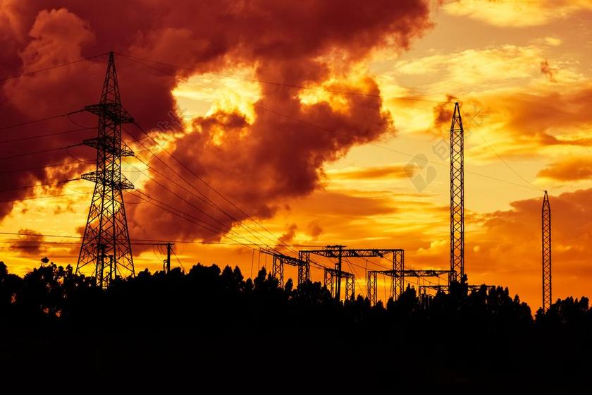 唯美夕阳下的电塔背景图片