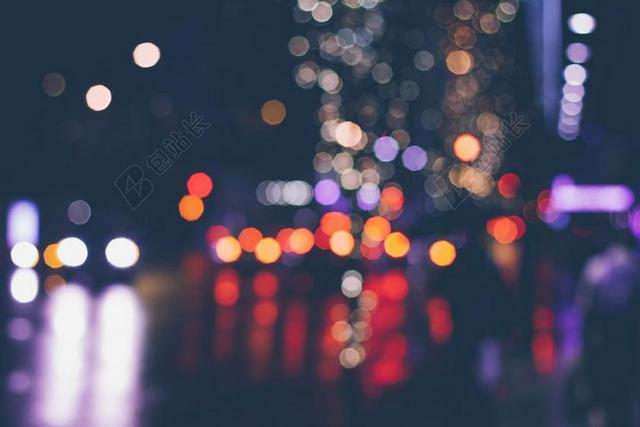 模糊的散景城市夜晚光多彩浪漫背景图片