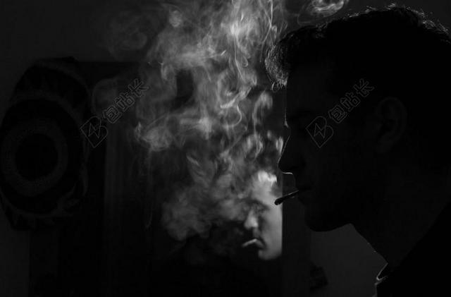 摄影清新抽烟的男子背景图片