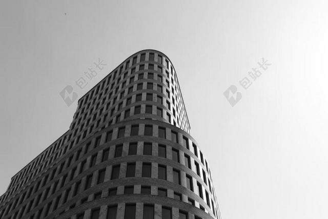 黑白建筑商务高层建造多个窗户背景图片