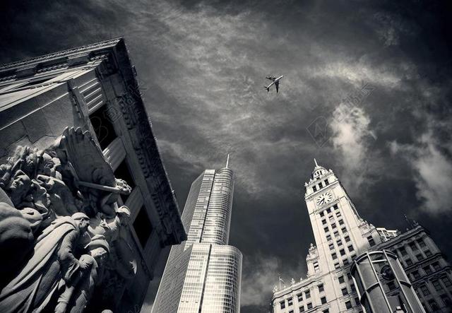 黑白炫酷建筑天空飞机背景图片