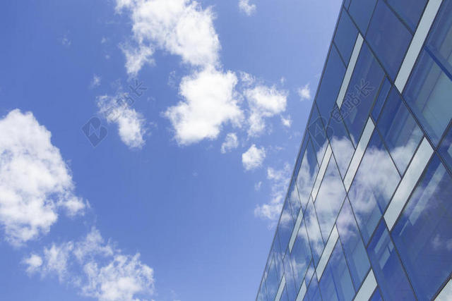蓝色仰视现代建筑高楼大厦背景图片