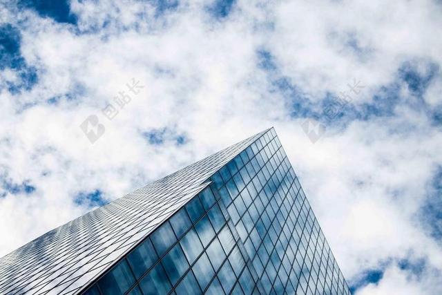 蓝色建筑天空蓝天白云高层大厦背景图片