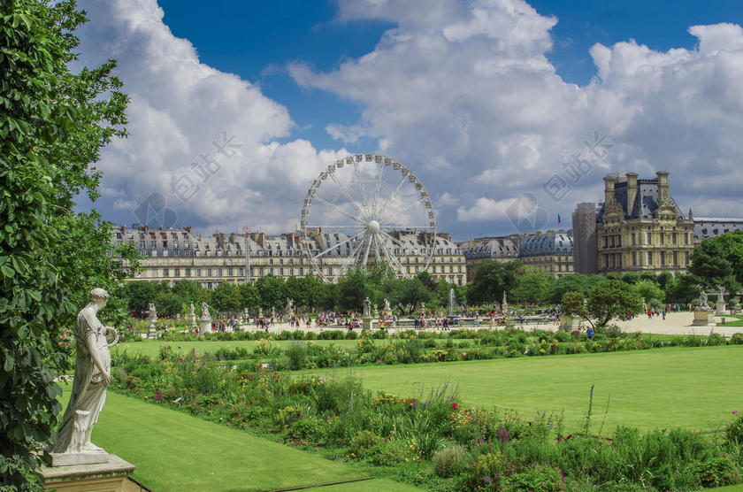 蓝绿建筑现代蓝天下的草地边上的摩天轮建筑休闲旅游观光建筑设计背景图片
