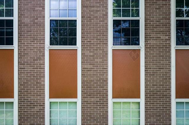 红棕色建筑现代教学楼复古墙砖背景图片