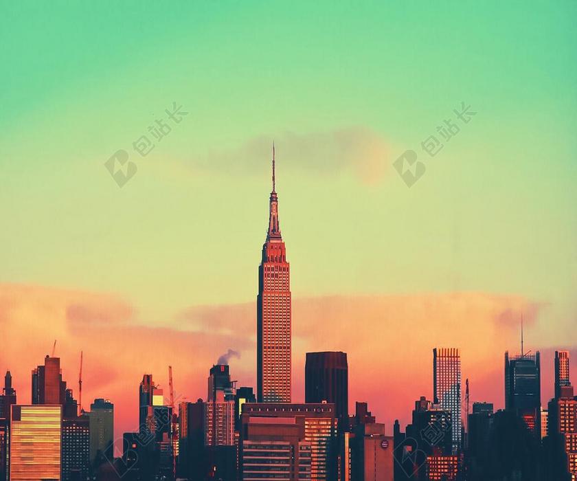 建筑商业城市景观商务塔日落天空背景图片