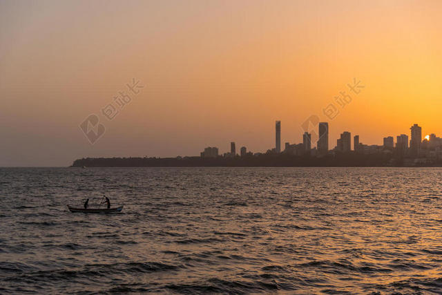 唯美夕阳下的城市景观背景图片