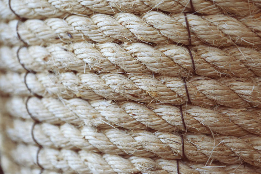 黄色纹理条纹粗麻绳缠绕一起纹理绳子设计背景图片