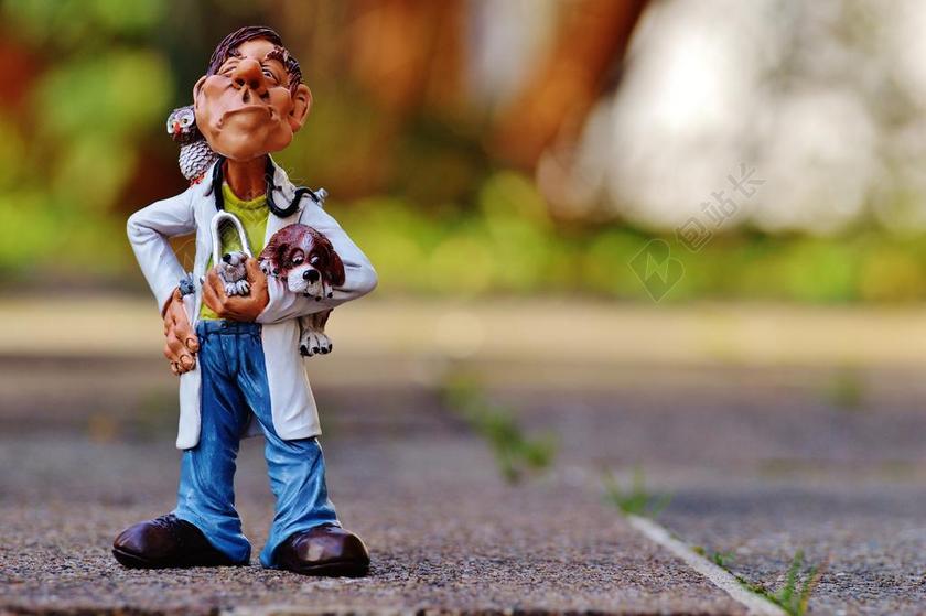 玩具卡通马路上的宠物医生玩偶背景图片