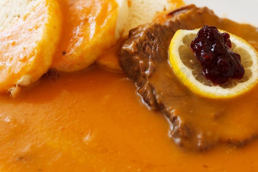 黄色餐饮纹理多汁美味的牛排背景图片