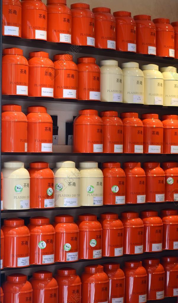 红白商品陈列茶叶罐茶叶展示背景图片