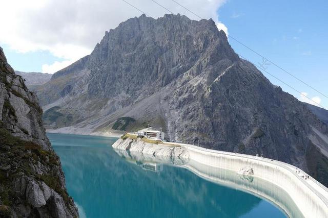 工业建筑人与自然水库大型水坝水能发电机山间背景图片