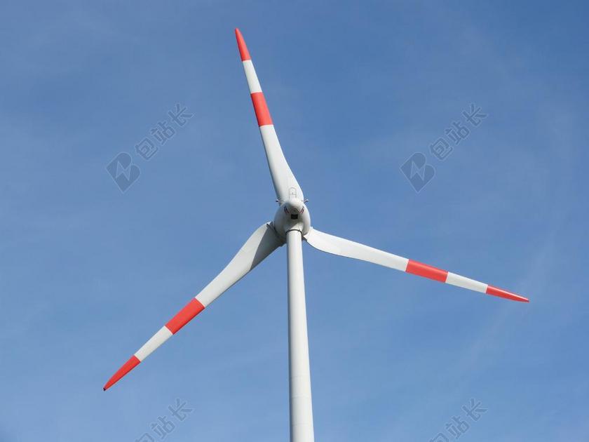 科技能源发展设备自然环保风力发电清洁能源风车特写蓝色天空背景图片