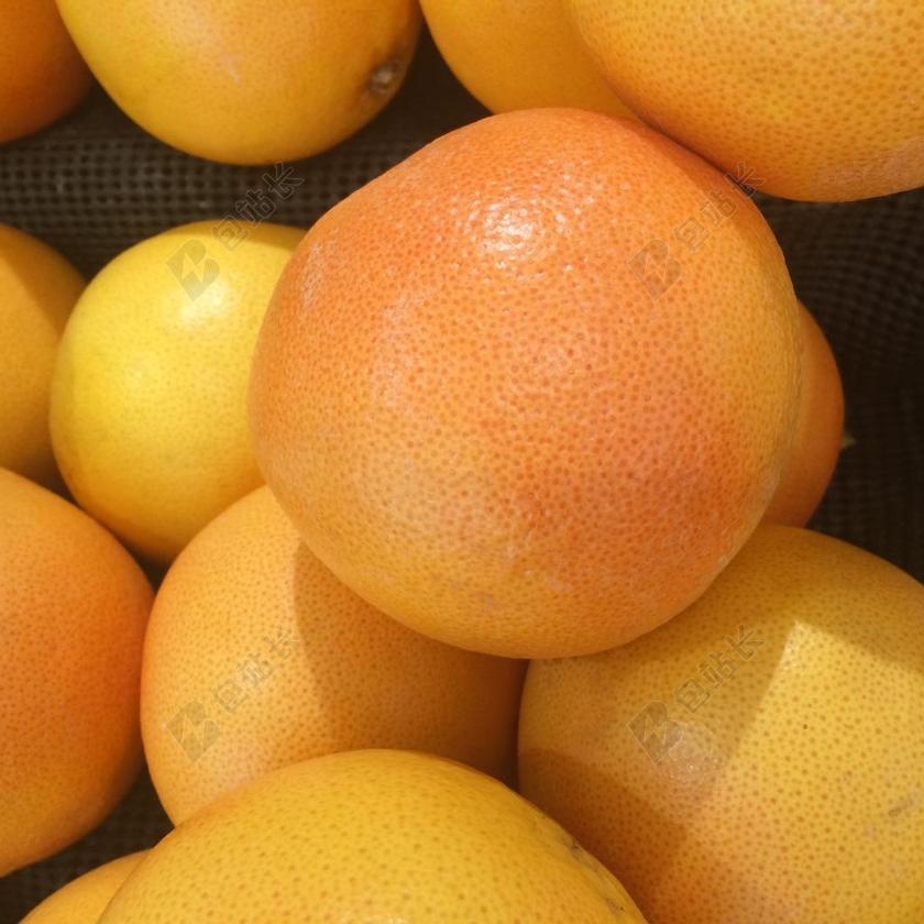 橙色水果果实葡萄柚进口水果成熟采摘可爱背景图片