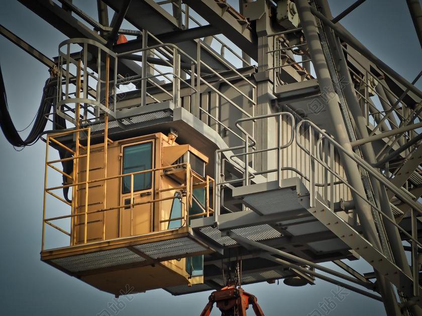 机械专业起吊机上的某个装置配件近照起重机配件背景图片